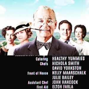 Bill Murray with cigarette and cigarette holder with three women and one man behind him. Credits catering Healthy Yummies and Chefs Nichola Smith