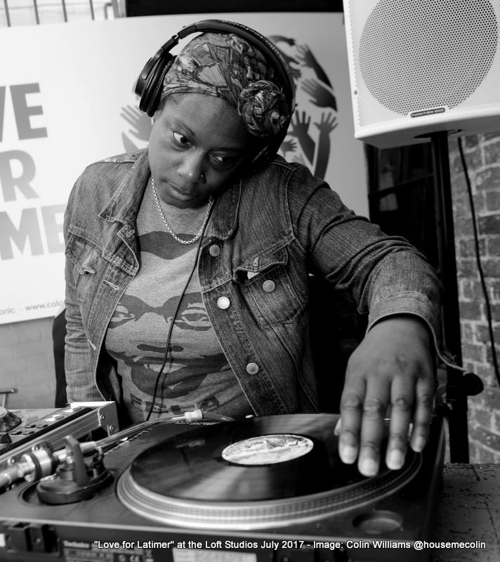 DJ Marcia Carr spinning vinyls