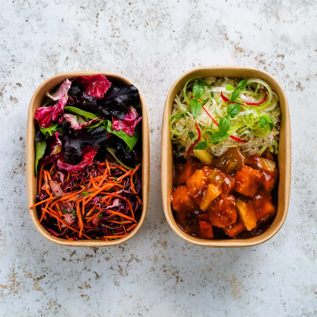 Two Yummies hotbox lunch dishes, photographed from above.