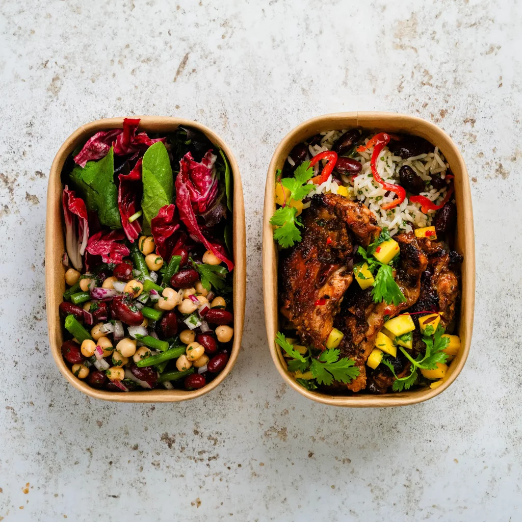 Two Yummies hotbox lunch dishes, photographed from above.
