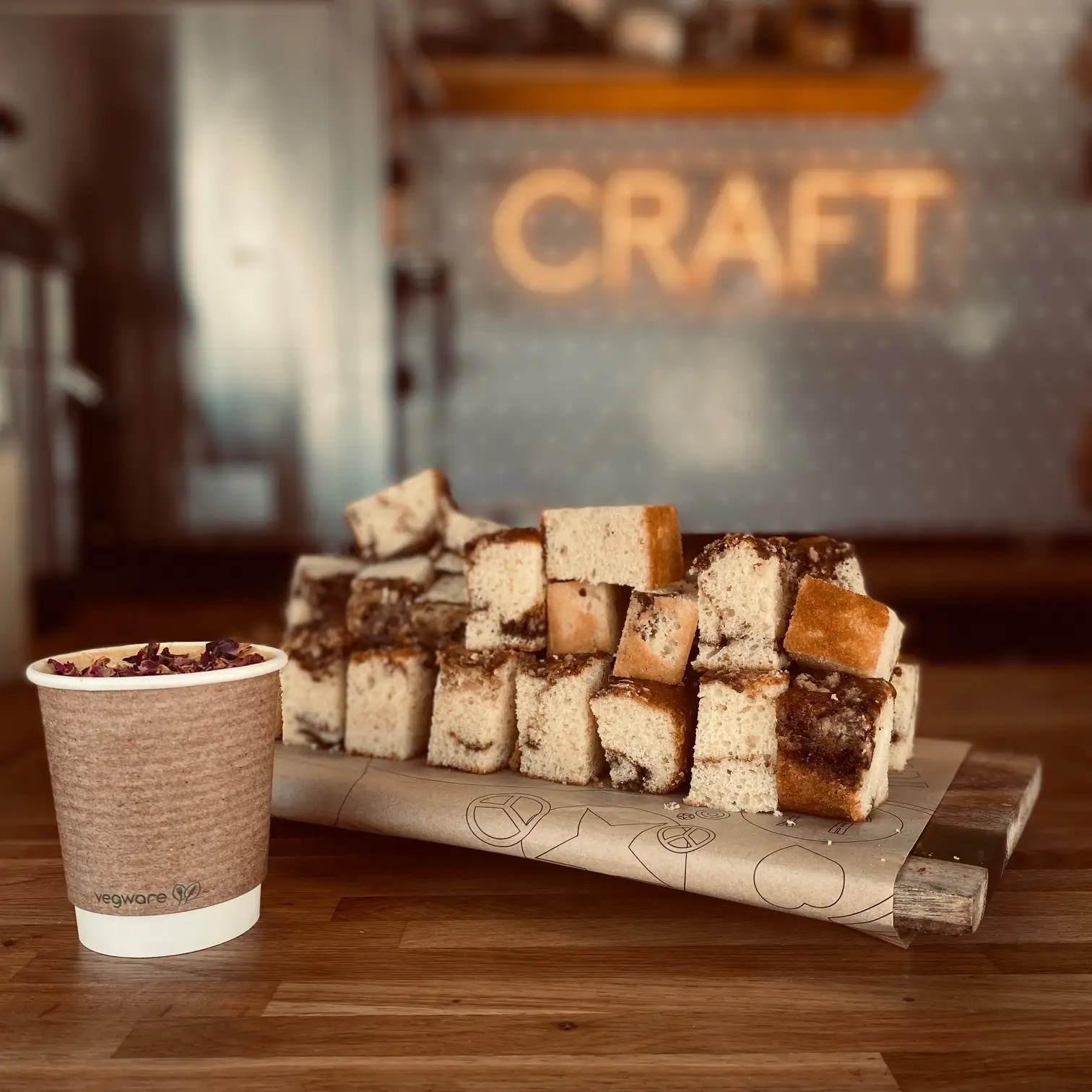 A photograph of coffee and cake in a craft services unit.